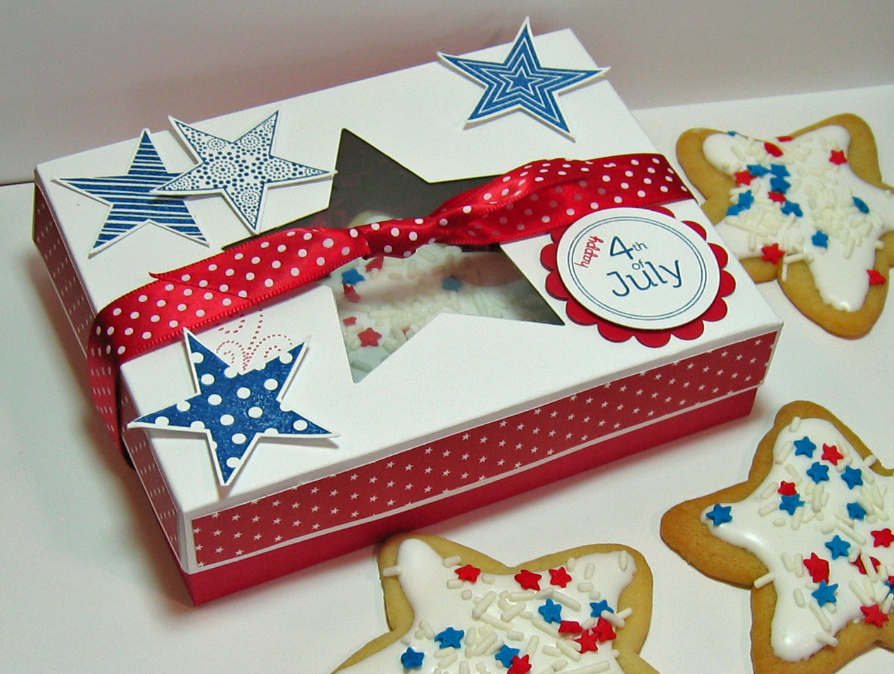 I used Lauren's Captured Card Case Template for my cookie box cutting the star out of the...