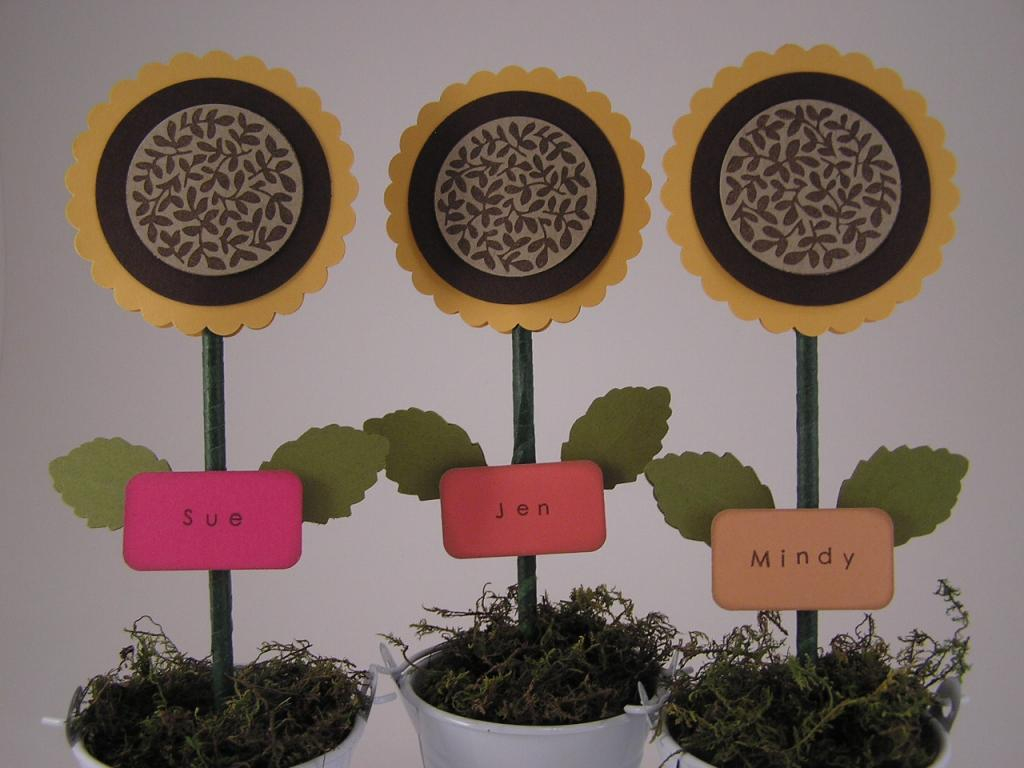 Set of 3 mini buckets $1 from dollar store.  Martha Stewart leaf punch.  Center of sunflower...