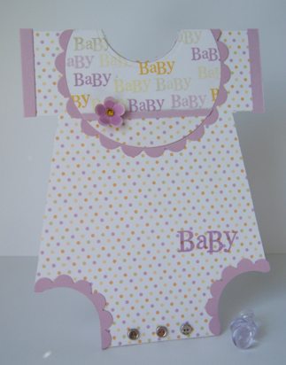I made a onesie shaped card.<br />
<br />
Supplies:<br />
Stamps: Mega Mixed Messages, and...
