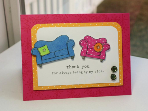 on my couch by my side