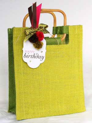 pom pom tag on bag