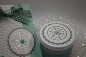 Embossed snowflake tag accents