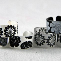ink: Black Palette Ink (on the clear and white) and White StazOn (on the black)
stamps: Garden of Life (Urban Design) by PTI
accessories: Polyshrink
tools: oven, form, sanding block

You can...
