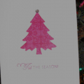 Pink Christmas Tree - I used Guidelines II to create my pattering using  stamped Raspberry Fizz Ink on Rasberry Fizz cardstock and punched with my slim EK Success Tree. Topped with a gem and a...
