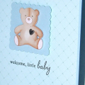 See?  You don't have to put the buttons on the images!!  In this case, a little heart brad worked great!