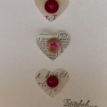 Stamps: sentiment from Daily Designs Sentiments by PTI
Ink: Pure Black by PTI
Cardstock: Vintage Cream by PTI
Other: Paper from a book
Accents" Buttons by PTI, Floss by Bazzill
Tools: Heart...