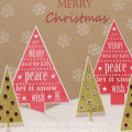 I used a die cut A2 card and created a Christmas tree scene.  I wanted a rustic country feel with the traditional red and green Christmas colors.