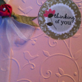 Sweet Blush Anniversary Tag...The tag appears through a window on the embossed folded card.  The rose is made with the Raspberry Fize Twill ribbon, small amount of avocado twill gives contrast as...