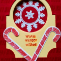 Stamps: Candy Cane Christmas, Tag It 8
Other: Cotton Candy Stickles, Filigree White Embossing Powder
Dies: Mat Stack 3