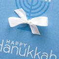 Supplies

Stamps: Menorah medley
Ink: Blueberry Sky, Versamark
Cardstock: Blueberry Sky
Other: 1/4" white silk ribbon, white embossing powder, yellow embossing powder