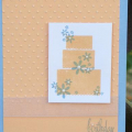 Piece of Cake stamp set used with CTMH CardStock and Ink in Creme Brulee & Lilac Mist, Ribbon is also CTMH.  Also used my Swiss Dots emobssing folder & pearl jems from Michael's.
