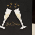 Supplies

Stamps: Propose a Toast
Ink: Versarmark, True Black, Fine Linen
Cardstock: Rustic White, True Black
Dies: Propose a Toast
Other: gold embossing powder