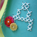 cross stitched tag