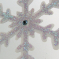 Close-up of Twirling snowflake in Warm Wishes card