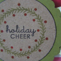 Wreath is from Tags and "holiday cheer" from Treats.  Striped paper from DCWV Christmas Stack.