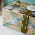 I re-covered a box and made my own transparency lid and filled it with some Yankee Candles.

Stamps: Remember, Holiday Tag Collection (just for the To:, From: on the tag)
Paper: Kraft, Ocean...