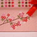 The baby card and gift box that I made were based on the bedding that was chosen for their baby girl. http://www.kidslineinc.com/products/infant/cherry_blossom.php

I used Around and About...