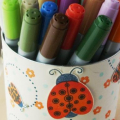 I made this to match the 'From the Desk of' to contain my growing collections of Copics!  Its a recycled dried milk tin.  Perfect size for my pens.