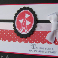 Stamps:  Wishing You
Paper:  Basic Black, Real Red, PTI White
Ink:  Pure Poppy, Memento Black
Accessories & Tools:  Oval and Scallop Oval Nestabilities, Scallop Edge Punch, Fresh Snow Satin Ribbon